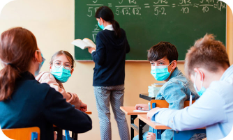 Happy students learning with technology in classroom
